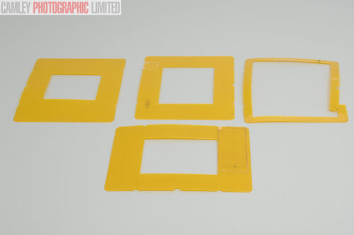 Sinar Masks Set of Four Transparent Yellow (534.16). Graded: AS-IS [#10360]